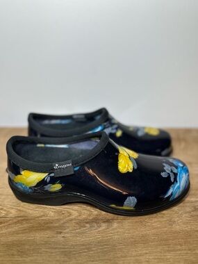 Sloggers Women's Black Slip-On Floral Clogs with Yellow & Blue Accents size 9